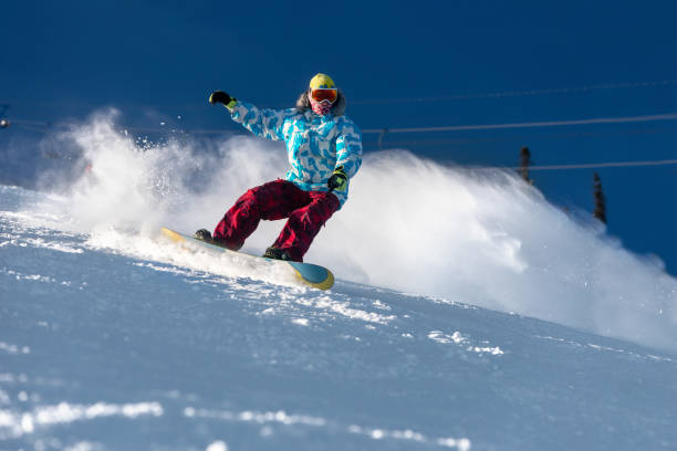 istock Fast snowboarder ski slope freeride 1059683506