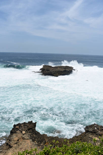 istock The rock between the high seas on the south coast 1059689642