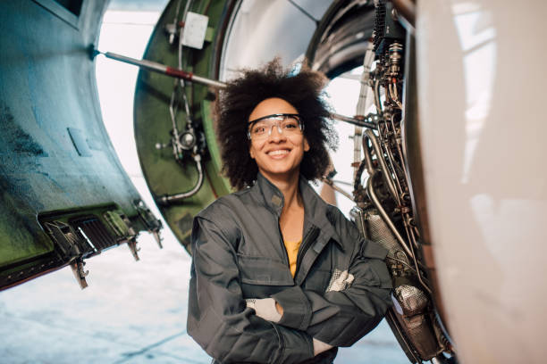 istock Happy female airplane mechanic 1059697318