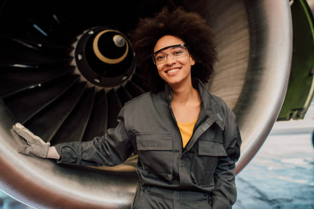 istock Smiling young female mechanic 1059697432