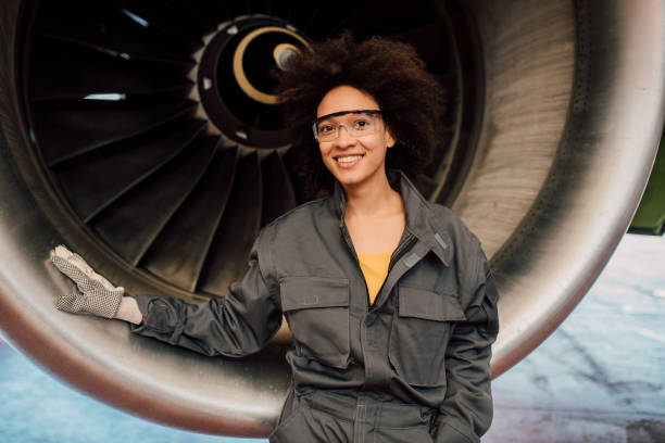 istock Happy mechanic leaning on an aircraft 1059697436