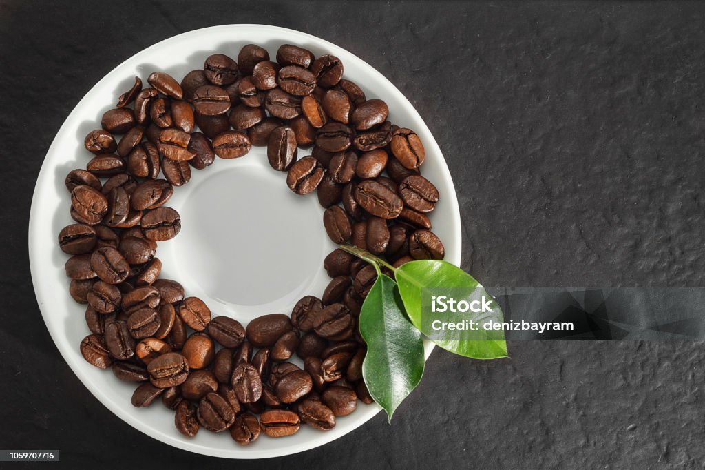 Coffee plate concept Coffee beans with stone plate Bean Stock Photo