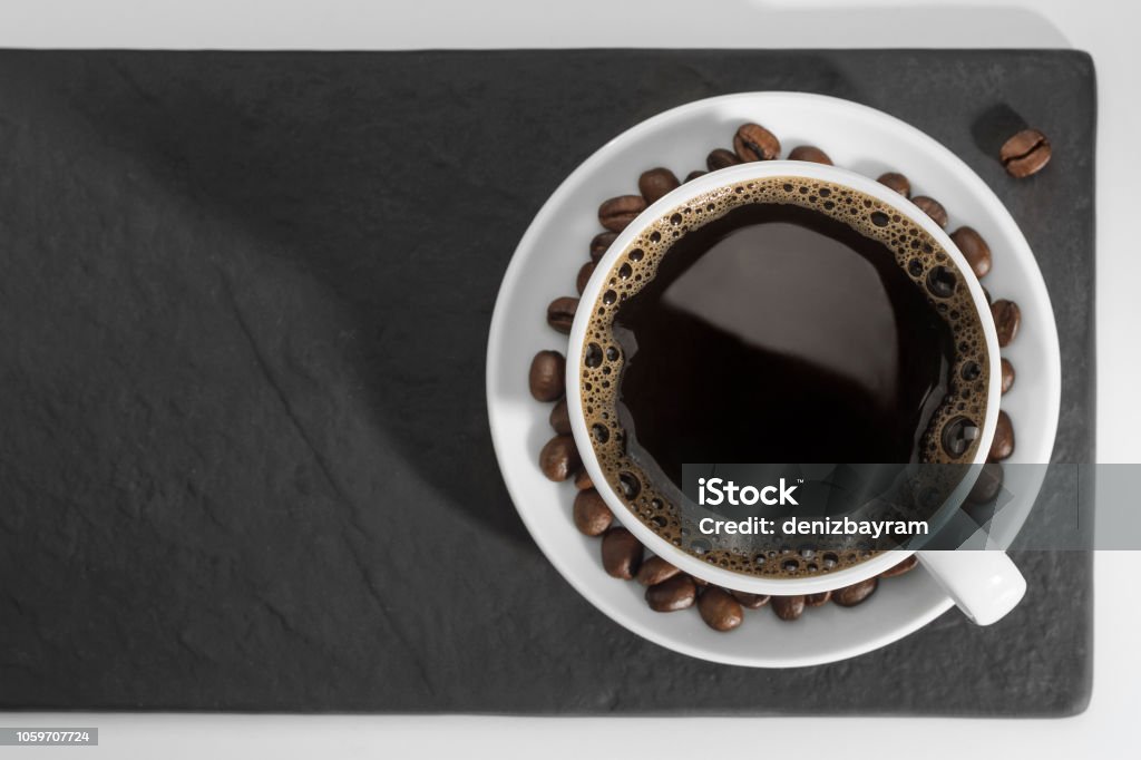 Coffee cup concept Coffee cup and coffee beans with copy space Bean Stock Photo