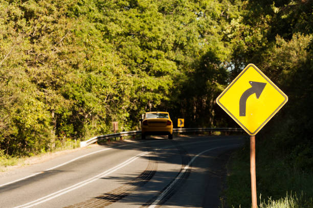 car crash in a curved road with skid marks - skidding bend danger curve imagens e fotografias de stock