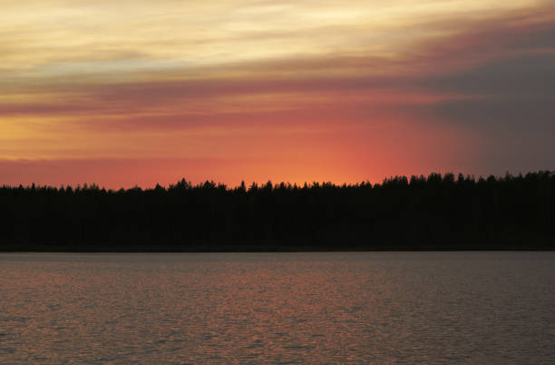 istock Evening light of the sun beside lake 1059717492