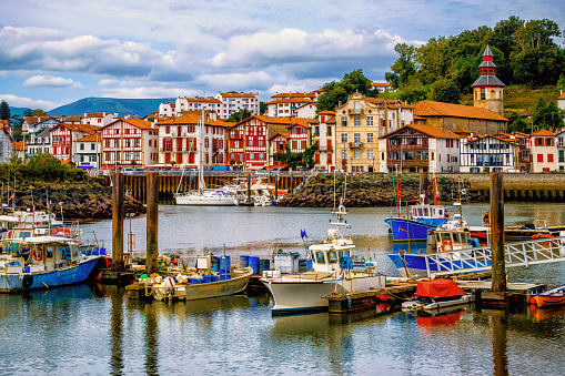 Colorful traditional basque houses in port of Saint-Jean-de-Luz Old Town, France