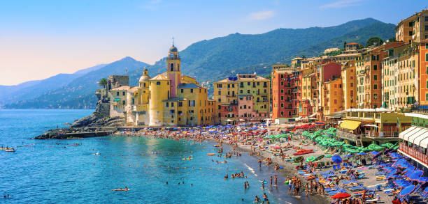 Panoramic view of historical Old Town Camogli and sand beach on mediterranean coast in Camogli, italian Riviera, Italy