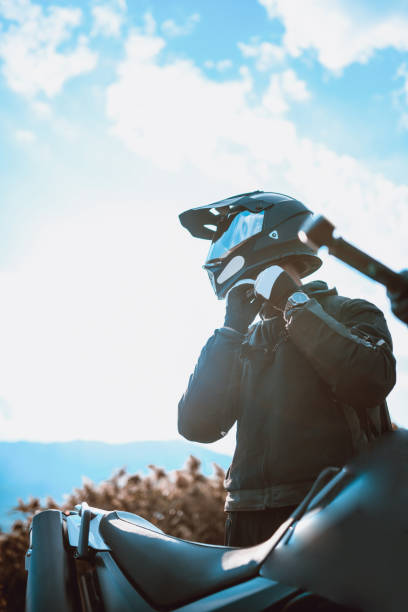 istock Putting Helmet On Before Motorcycle Ride 1059727786