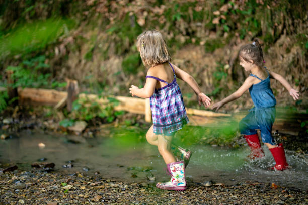 istock Little girls in rubber boots 1059734038