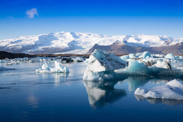 Glacier lagoon, Iceland Glacier lagoon, Iceland iceberg dramatic sky wintry landscape mountain stock pictures, royalty-free photos & images