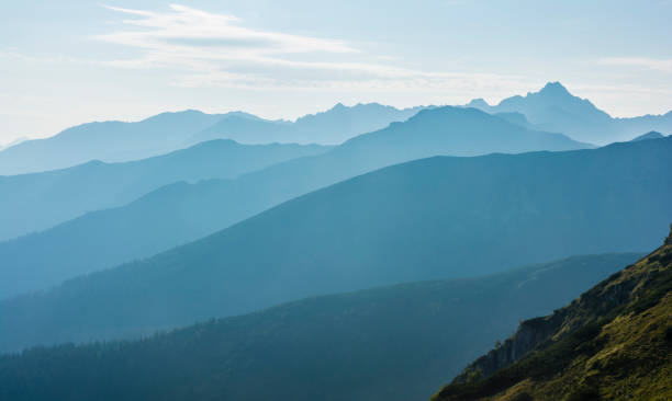 istock Mountains and morning fog. 1059735482