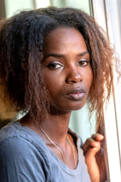 istock Serious young beautiful black woman 1059736388