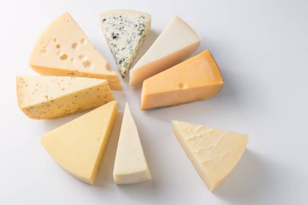 istock Different kinds of cheeses isolated on white background. 1059738092