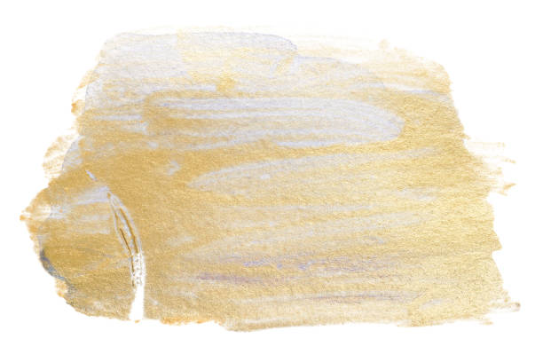 istock Golden paint stain isolated on white background. element for design. gradient gloss of metal. 1059739896