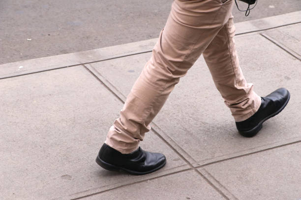 istock man walking down the street 1059739996