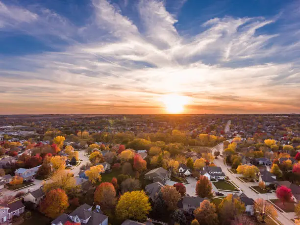 Sunset in the fall over the suburban neighborhood