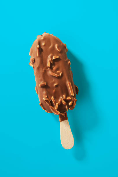 Hand holding Chocolate almonds Ice cream bar isolate on white background