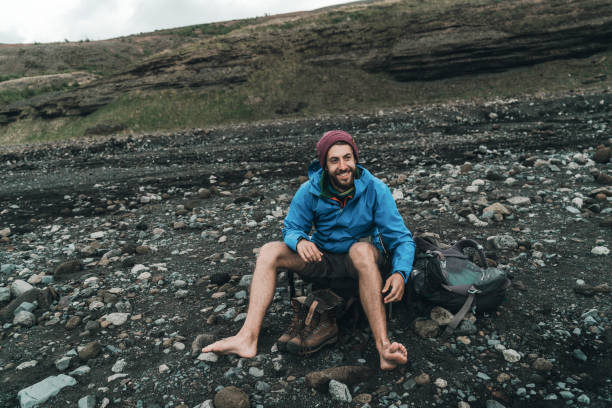 istock Man getting ready to  cross river in Iceland Highlands 1059744532