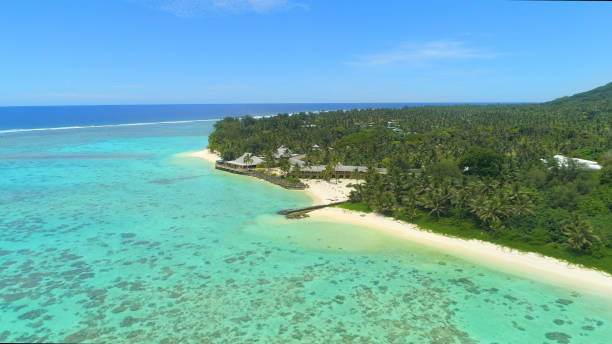 istock AERIAL: Flying towards a luxurious oceanfront resort in beautiful Cook Islands. 1059748352