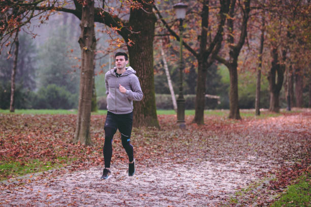 istock Autumn run in the park 1059751366