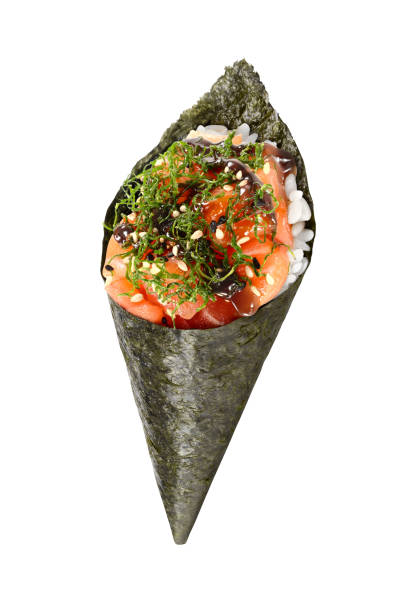 Delicious Salmon Temaki Hand Roll with Collard Greens A large cone-shaped piece of nori with the salmon and collard greens with tare sauce out the wide end fusion food photos stock pictures, royalty-free photos & images