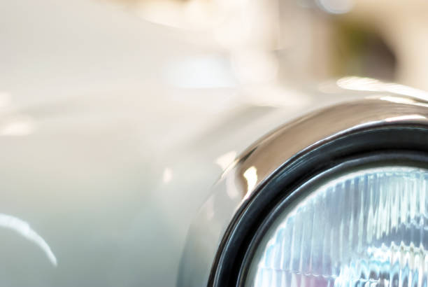 istock light background with headlight of a vintage car close up 1059757564