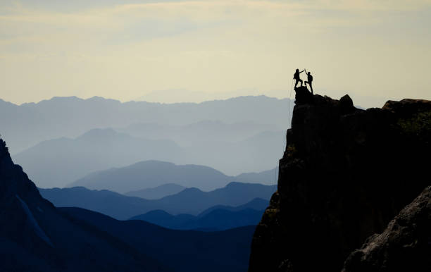 istock rock climb success and charming mountains 1059763926