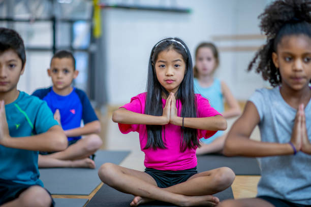 istock Girl in prayer pose 1059764168