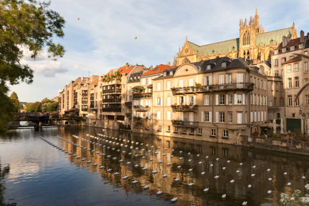 Cathedral of Saint Stephen and Moselle River in Metz. \nMetz, Grand Est, France.