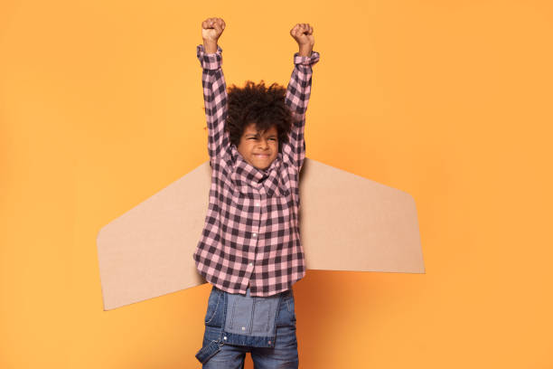 istock Little boy with afro hairstyle posing. 1059767532