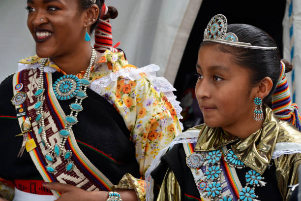 Indigenous Peoples Day Santa Fe, NM - October 8, 2018: Two young Native-American woman from Zuni Pueblo in New Mexico participate in Indigenous Peoples Day in Santa Fe, New Mexico. zuni pueblo stock pictures, royalty-free photos & images
