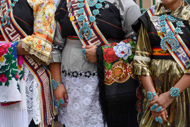 Indigenous Peoples Day Santa Fe, NM - October 8, 2018: Native-American woman from Zuni Pueblo in New Mexico wear traditional Zuni ceremonial attire and turquoise jewelry at Indigenous Peoples Day in Santa Fe, New Mexico. indigenous peoples day stock pictures, royalty-free photos & images