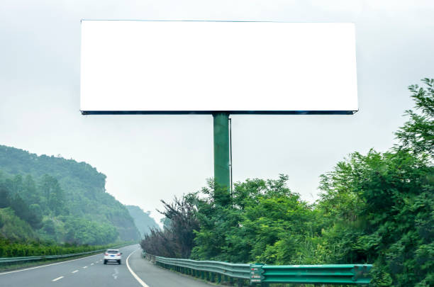 istock Blank billboard on blue sky background for new advertisement 1059798750