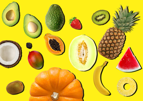 Fresh Tropical fruits on multicolored pop art Background .Vitamins Healthy Diet Spring Summer Detox Vegan. Ready to write.Poster Banner Template.