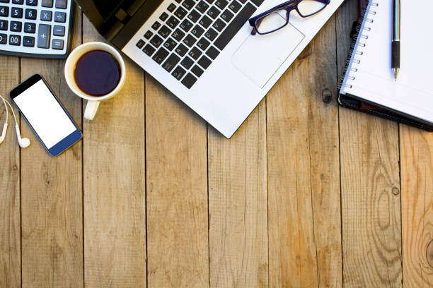 istock Business equipment on wooden table. Workplace and office concept. 1059806052