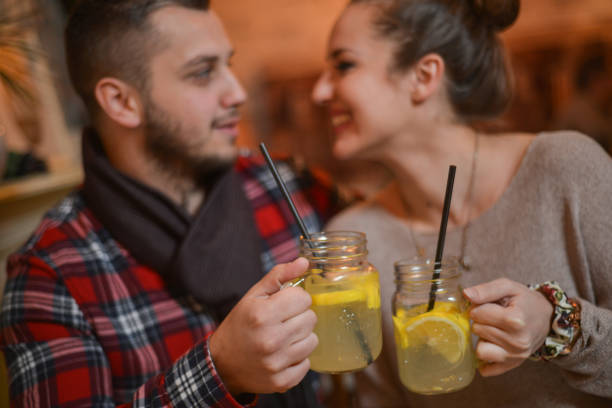 istock boy and a girl in a cafe 1059810078