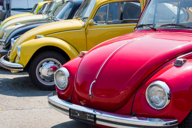 Vintage Volkswagen cars Lauerz (Canton of Schwyz), Switzerland - August 21, 2018: Old Wolkswagen cars renewal service (Extreme Cars) in Lauerz, Canton of Schwyz, Switzerland. Here, rash cars and minibuses are renewed and sold as second hand. car transporter truck small car stock pictures, royalty-free photos & images