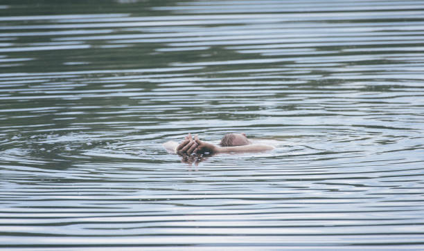 istock Senior Man Swimming In Lake 1059852768