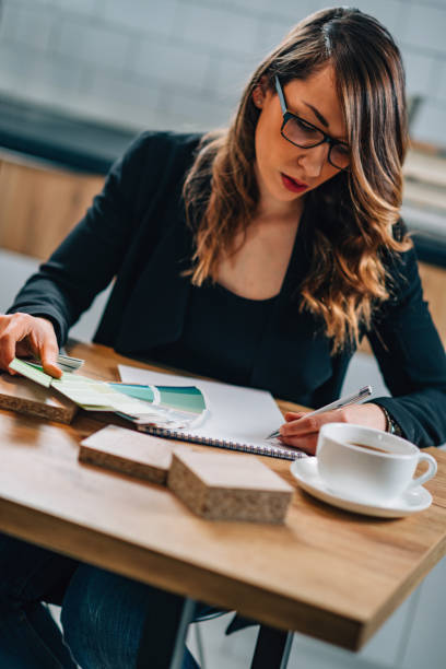 istock Serious Businesswoman Working At Table In Office 1059859934