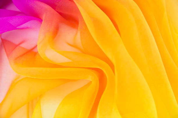 istock Texture chiffon fabric pink and yellow  color for backgrounds 1059872244