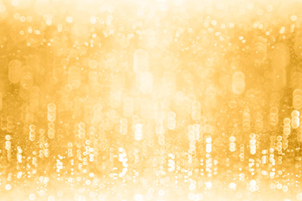 Gold Glitter Sparkling Background for New Year Eve Champagne Bubbles or Birthday Anniversary stock photo