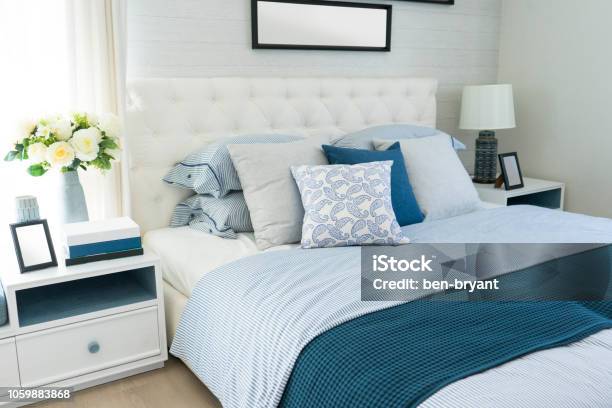 Beach Blue Pillow On Bed In Bedroom Stock Photo - Download Image Now - Bedroom, Blue, Bed - Furniture