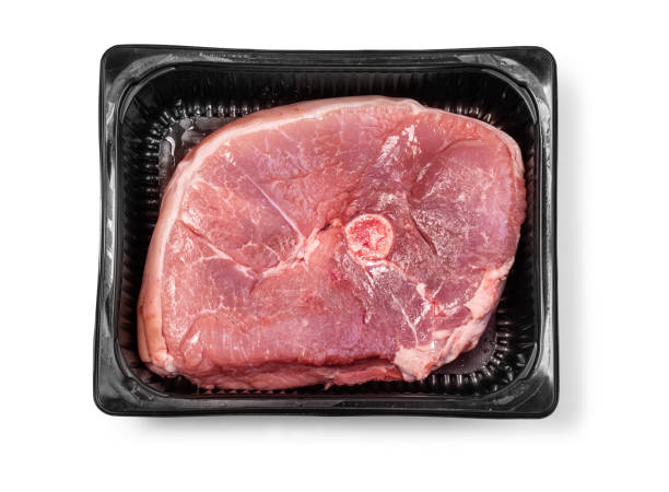 istock Lamb meat steaks (boneless leg) in styrofoam packaging tray 1059909394