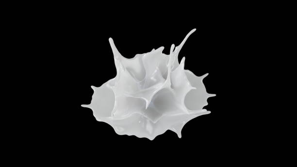 istock Milk splashing on black blackground. 1059910792