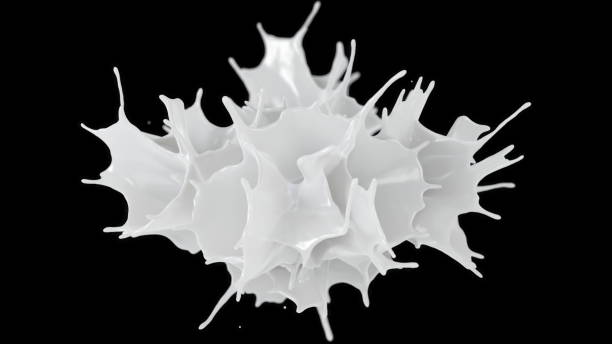 istock Milk splashing on black blackground. 1059910838