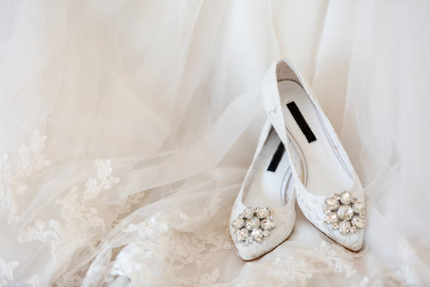istock White wedding dress and white wedding shoes 1059920506