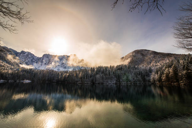 istock first snow at the mountain lake 1059922564