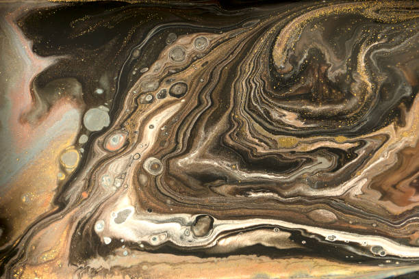 istock Gold marbling texture design. Beige and golden marble pattern. Fluid art. 1059931082