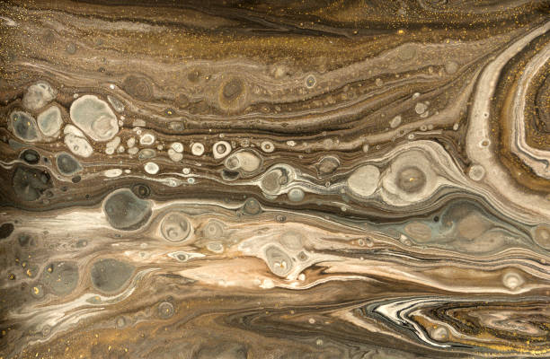 istock Gold marbling texture design. Beige and golden marble pattern. Fluid art. 1059931110