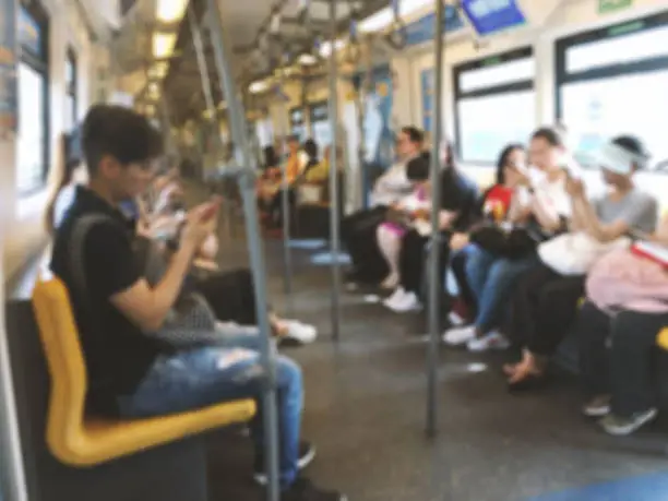 Photo of Abstract blurred people sitting on sky train, public transportation.